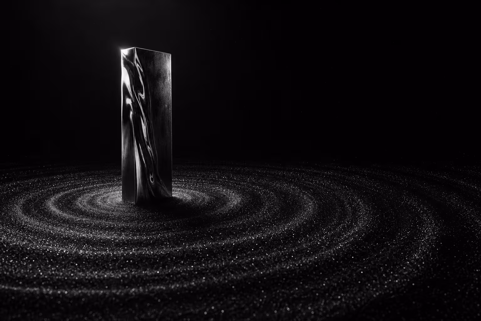 Dark chrome monolith emitting concentric ripples through metallic dust on black